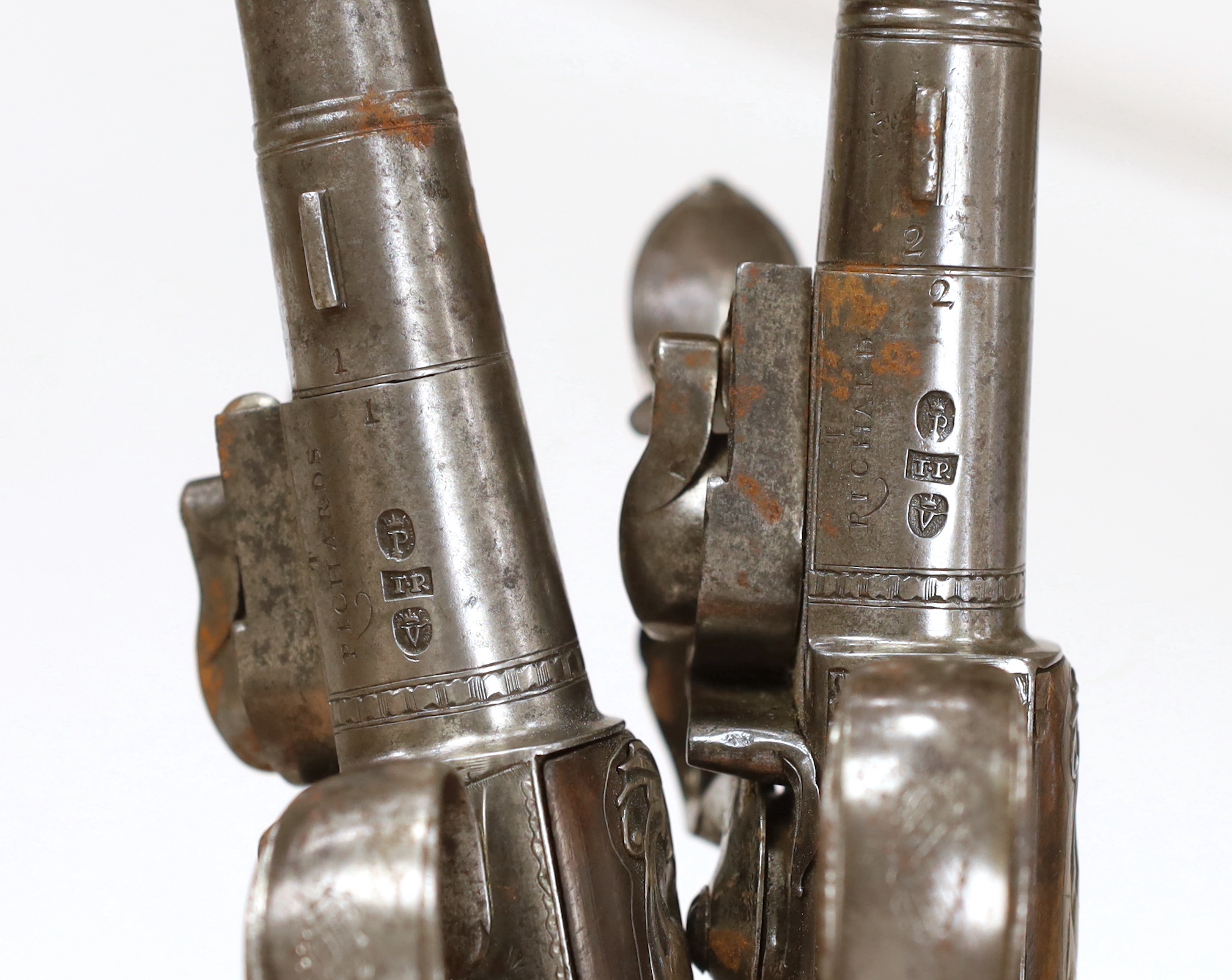 A pair of Queen Anne cannon barrel side hammer flintlock holster pistols by T. Richards, c.1770